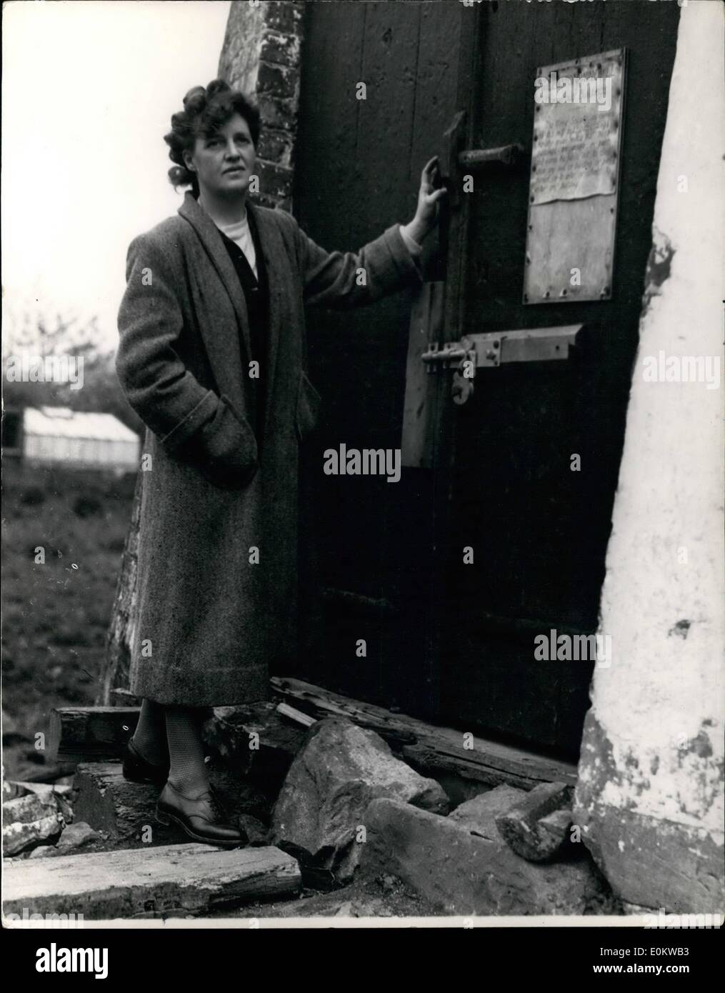 May 05, 1950 - Livepool school inspector intends to convert a mill into a home.; Mrs. Geoffrey Conway, wife of a Liverpool School Inspector seen at the doorway of an ancient windwill at Willerton, Cheshire which they intend to convert into a home. Stock Photo