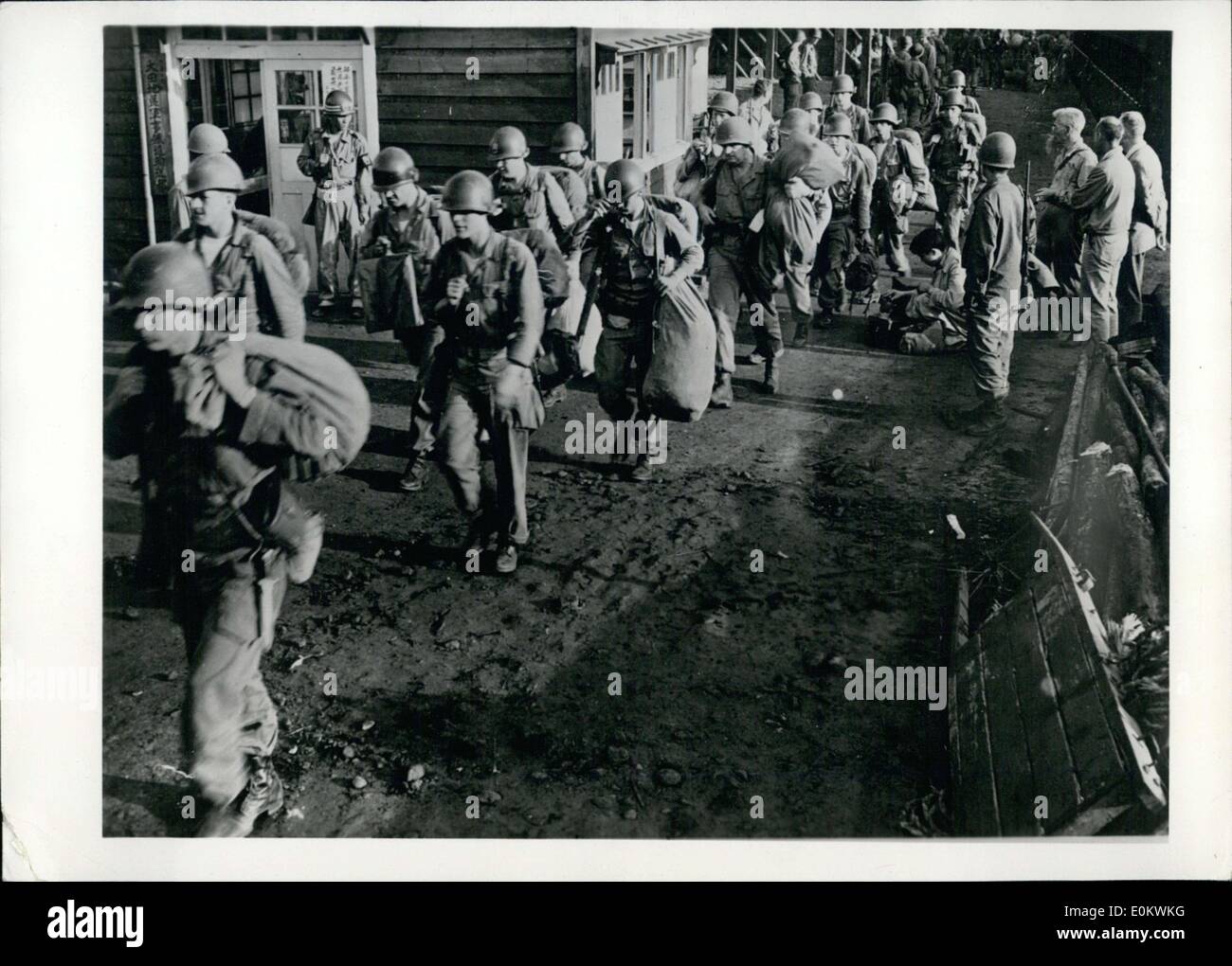 Jul. 20, 1950 - General Bradley combined the troops of the 24th Infantry Division with a South Korean troop division in order to try and alter the stalemate between North and South Korea. Pictured here is the 25th Division as it marches to the Front. Stock Photo