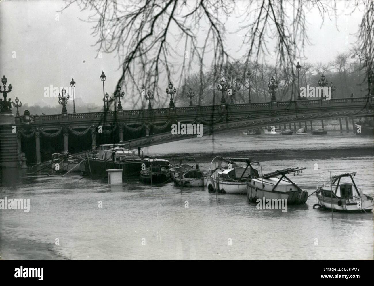 Jan. 01, 1952 - Floods In Paris: Pleasures boats moored alongside the quay under the Alexander III bridge are in the middle of the seine and cannot be reached from the flooded banks. Stock Photo