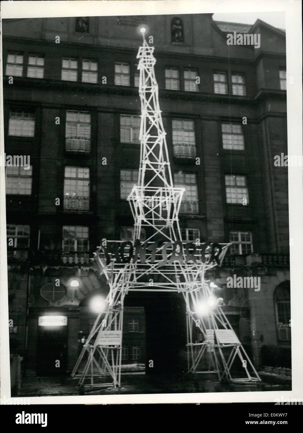 Jan. 30, 1952 - Paris comes to the Alster! A miniature Eiffel Tower was displayed before the Curio-House as an emblem of the huge, soon-to-occur art-festival ''Monsartre'' in Hamburg. Jean Paul Sartre, Simone de Beauvoir, and other Parisian guests were invited to the festival, which is under the protectorate of the French consul general of Nerciat. Stock Photo