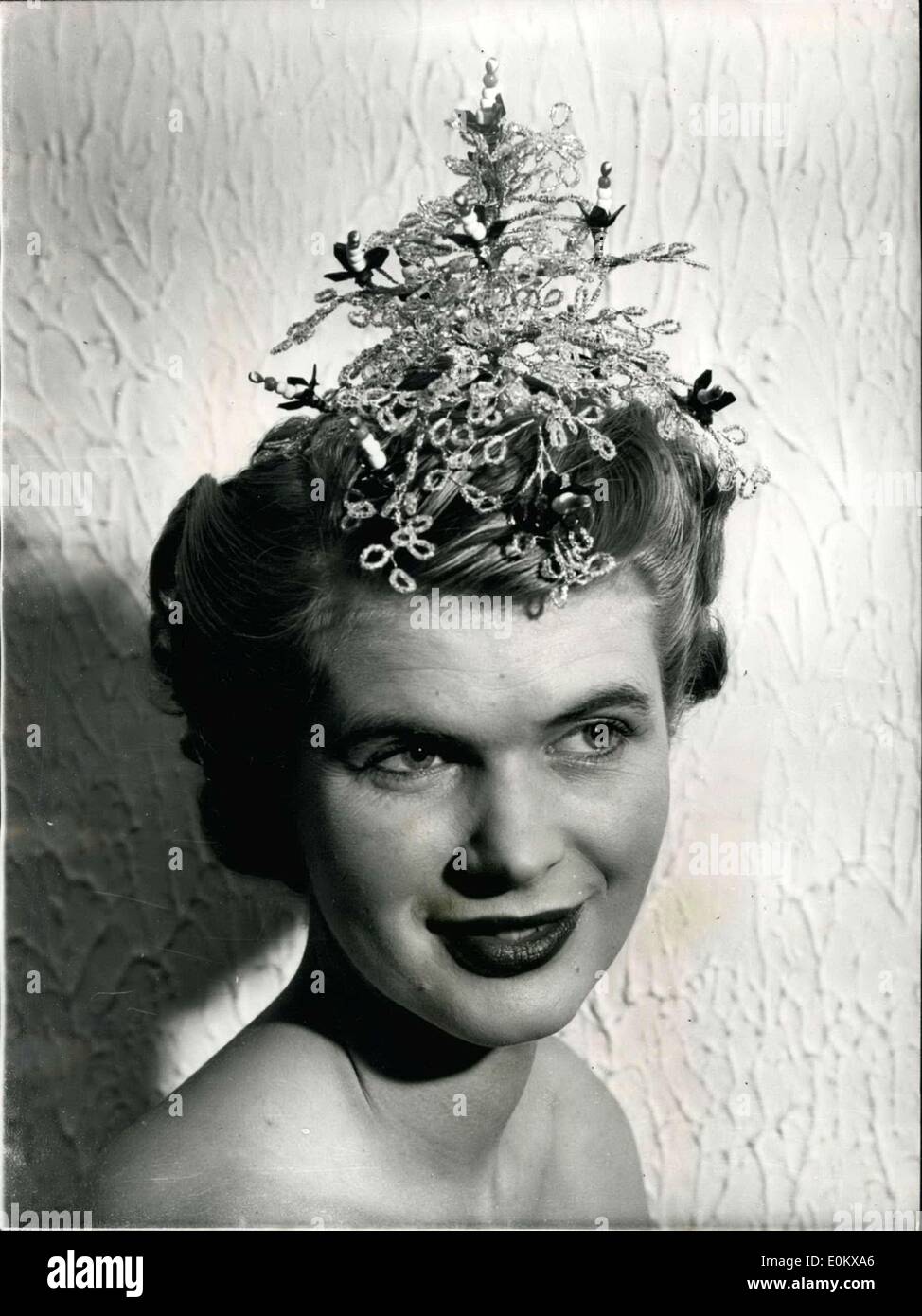 Nov. 09, 1950 - 9-11-50 The Noel Hair Style. Keystone Photo Shows: A Christmas tree of sparkling beads goes to make this hair style called Noel , a creation by Riche, which Nov. 09, 1950 - 9-11-50 The Noel Hair Style. Keystone Photo Shows: A Christmas tree of sparkling beads goes to make this hair style called Noel , a creation by Riche, which