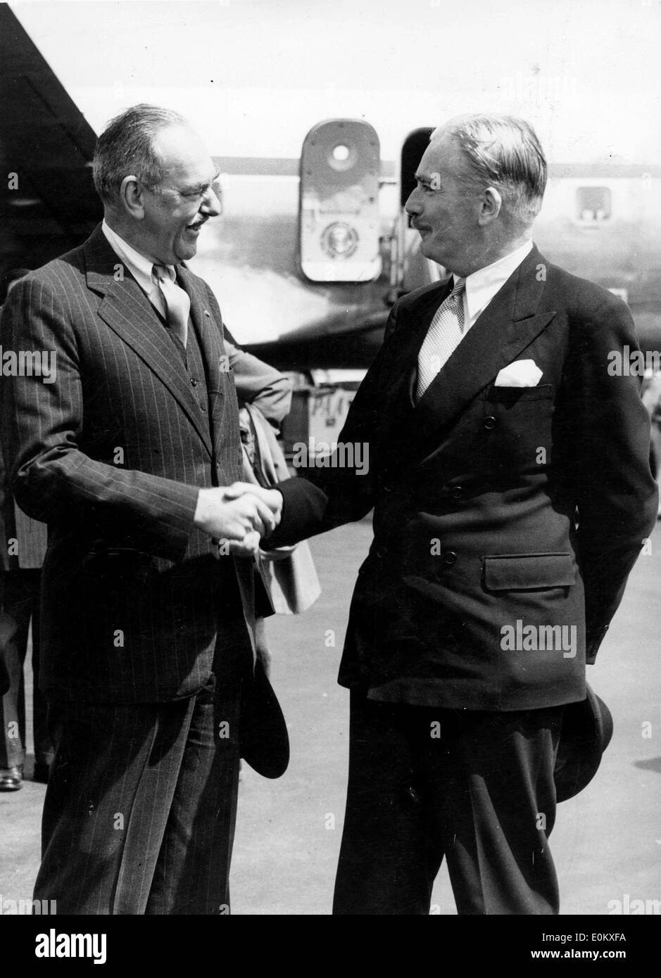 Dean Acheson welcomed by Anthony Eden Stock Photo