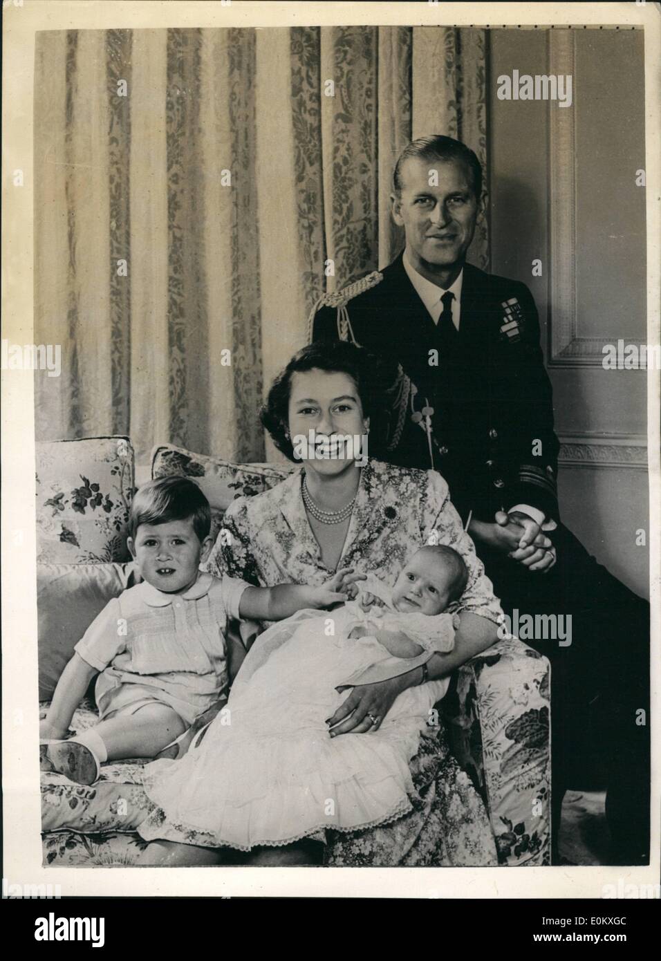 Jan. 01, 1951 - Princess Elizabeth and her Family Royal Command group clarence house. Most resent photograph taken by baron of Their Royal Highness's princess Elizabeth , the Duke of Edinburgh and their children princes Charles and princess Anne. The duke of wearing the uniform of a Lieut commander of the Royal Navy. This picture - a Royal command study was taken in the ''(Illegible)'' sitting room of Clarence house. Stock Photo
