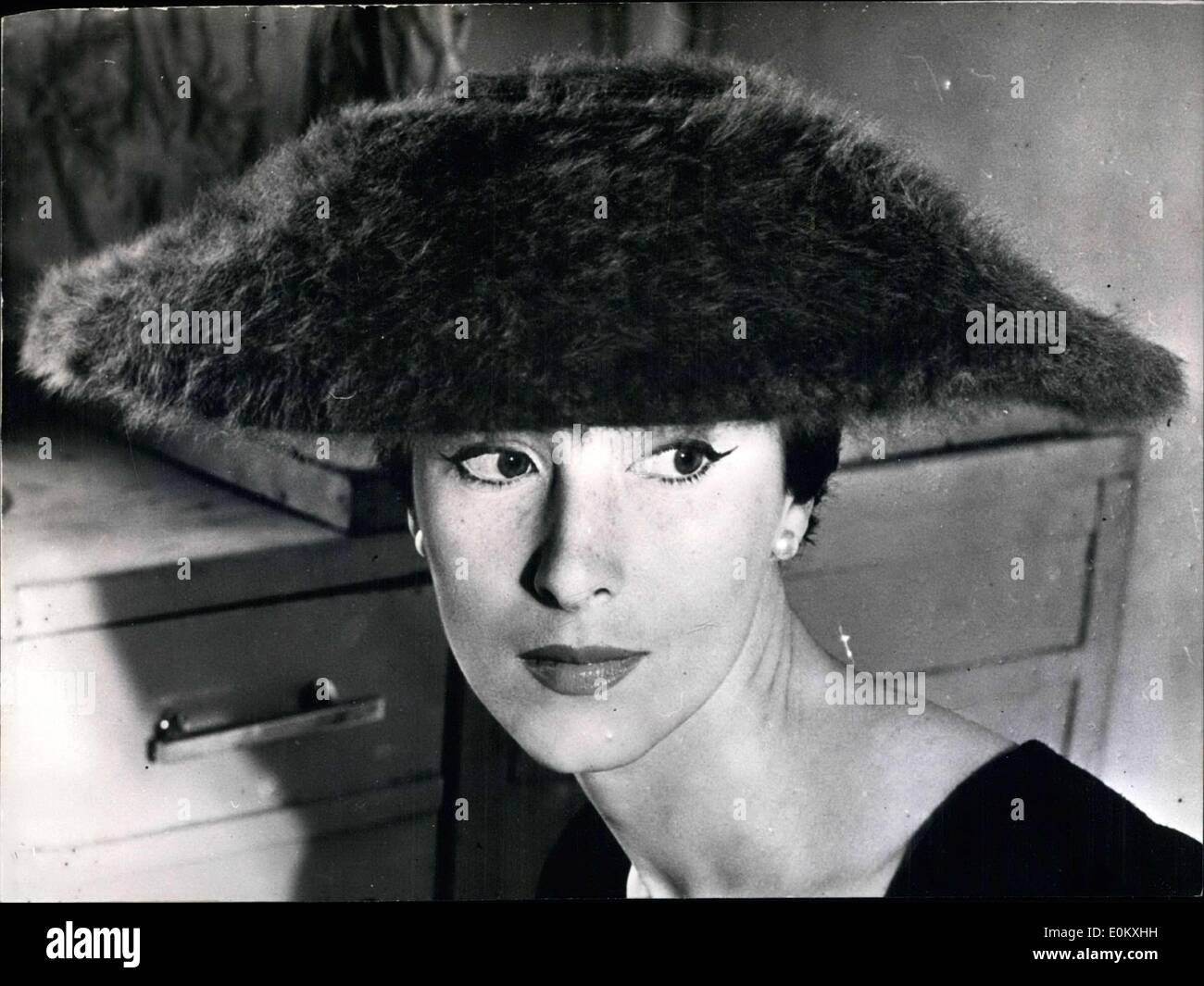 Oct. 02, 1952 - Such a beautiful Angora-hat... This adorable head-wear was made by a London studio. It is an allweather hat. (Cr Stock Photo