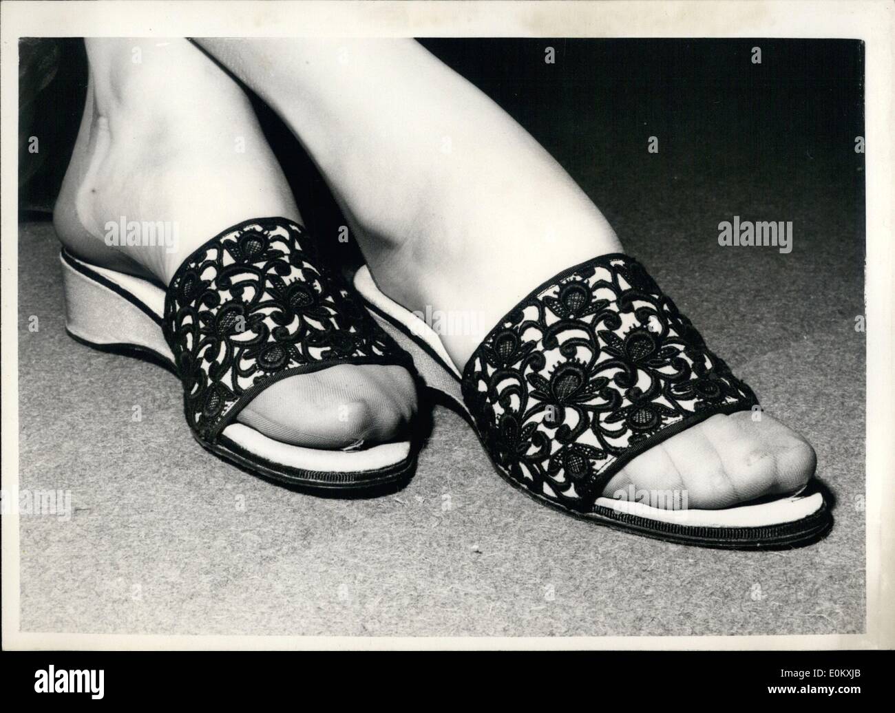 Oct. 10, 1952 - New Styles in Footwear on show in London. The Style for the TV hostess. Photo shows A TV Hostess mule with black lace on pink satin it is one of the new shoe styles on show at the Washington Hotel, London, today. Stock Photo