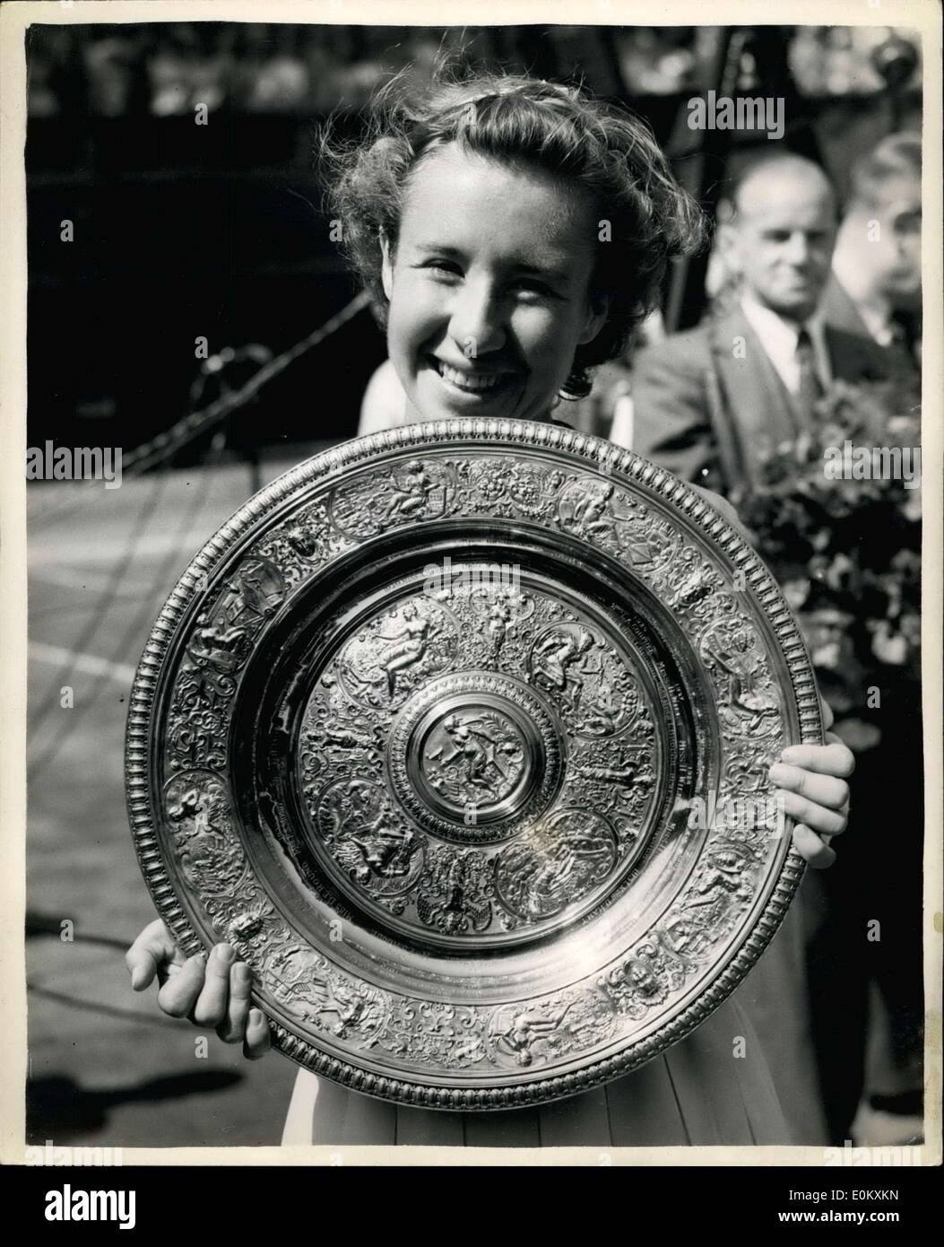 Jul. 05, 1952 - ''Little Mo'' Wins Tennis Final: Miss Maureen Connolly (Little Mo) U.S.A., today beat Miss Louise Brough, U.S.A. in the Women's Singles Final at Wimbledon today. photo shows. Miss Maureen Connolly photographed with her trophy after her victory today. Stock Photo