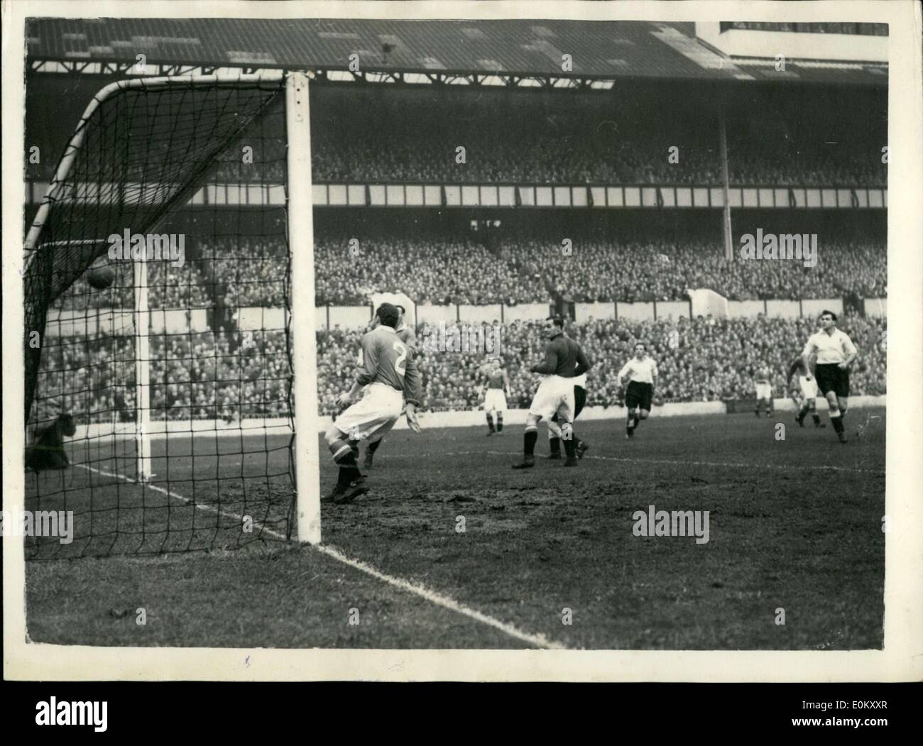 Nov. 01, 1952 - Spurs versus Manchester united Walters scores for Tottenham. Photo shows Walters the spurs outside right (on extreme right) headed this first goal for spurs - watched by crompton the Manchester Goalkeeper, and Monulty the Manchester right back at white hart lane this afternoon. Stock Photo