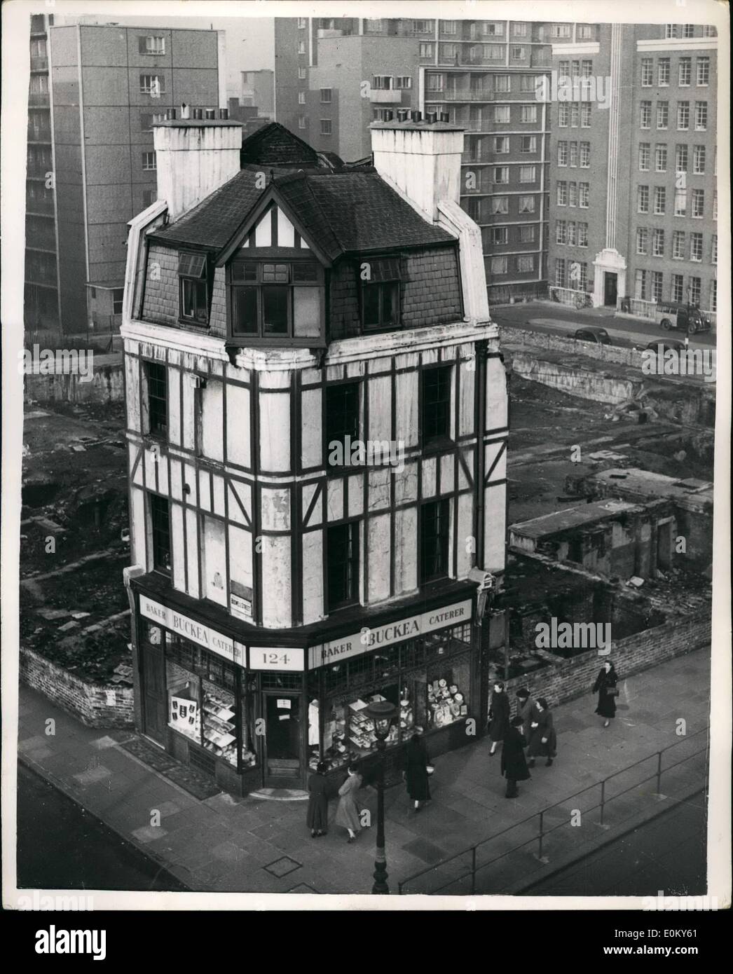 Nov. 11, 1952 - It Stands Alone Ancient and Modern in London: A little bit of old London survives on the blitz site at the corner of Boswell Street and theobalds Road, Holborn. It contrasts with the modern block of council flats and civil Aviation offices in the background. Stock Photo