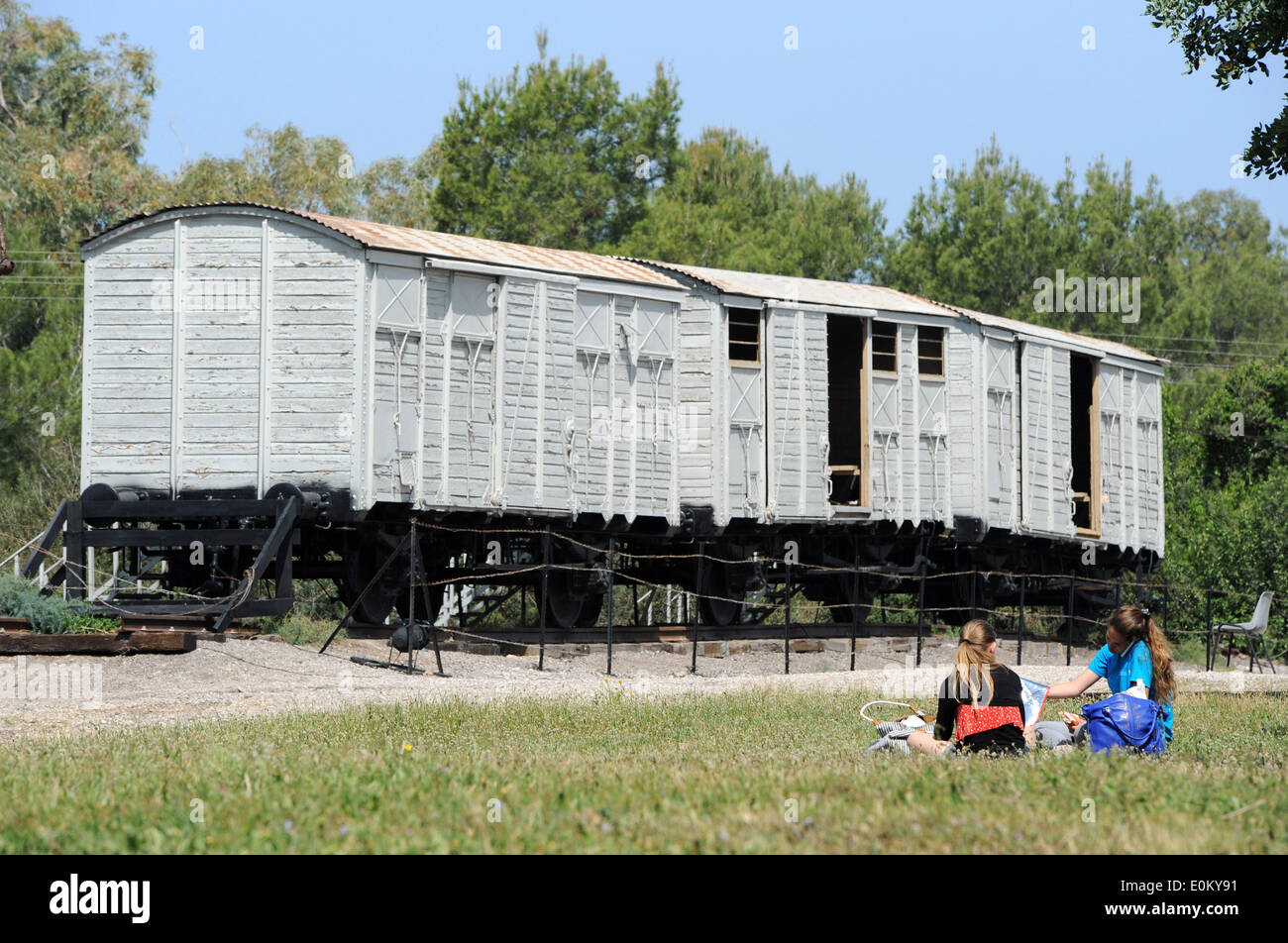 The photo from 08.04.2014 shows three freight cars at the site of Atlit Immigrants Detention Camp (Ha'apola Museum) in Haifa/Israel. From 1939 to 1948 the Camp served as a detention center for illegal Jewish immigrants. Stock Photo