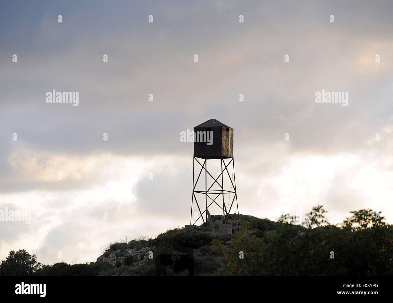 The photo from 09.04.2014 shows one of the watchtowers at the site of Atlit Immigrants Detention Camp (Ha'apola Museum) in Haifa/Israel. From 1939 to 1948 the Camp served as a detention center for illegal Jewish immigrants. Stock Photo