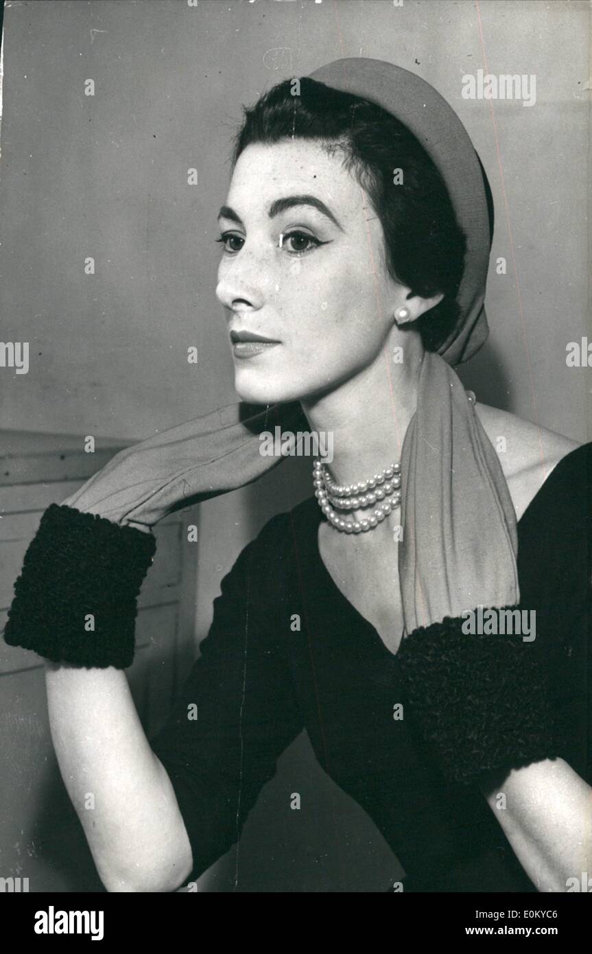 Sep. 09, 1952 - The Hat - With Muffs Attached: This Black velvet and red wool ballerina head-dress which has edgings of strakan which can be used as muffs- seen during the Simons Mirman Hat show in London today. Stock Photo