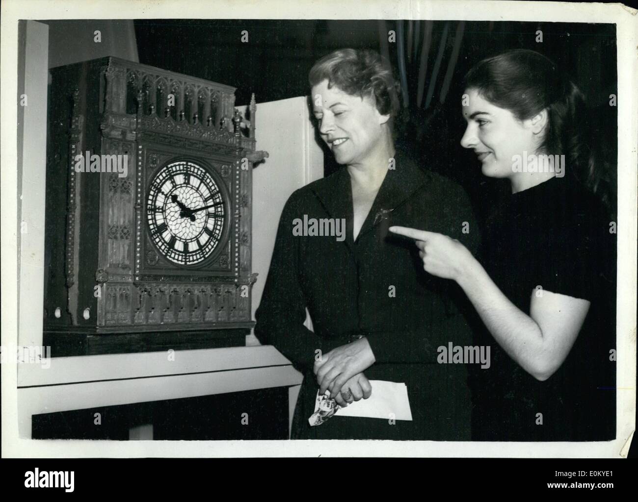 Sep. 09, 1952 - New clock for T.V. to replace the ''Goodnight Smile'' a fave for a face.: Two things are to disappear from Television the announcer's ''Goodnight Smile'' and the brass faced clock which gives viewers a final time check each night. A new clock has been designed by Mr. Robert Davis a London Sculptor. In future the sound-only news bulletin will be followed by the announcer saying goodnight. This is estimated to serve keeping five view transmitters operating another 15 minutes each night. Photo shows Joan Gilbert the T.V Stock Photo