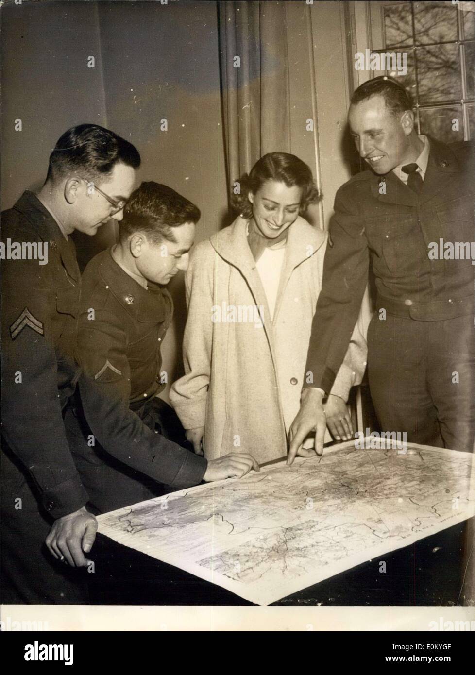 Nov. 26, 1952 - The end of walk.: Three G.I.'s and a German woman went out for a nice, little , walk, and, owing to conflicting Stock Photo