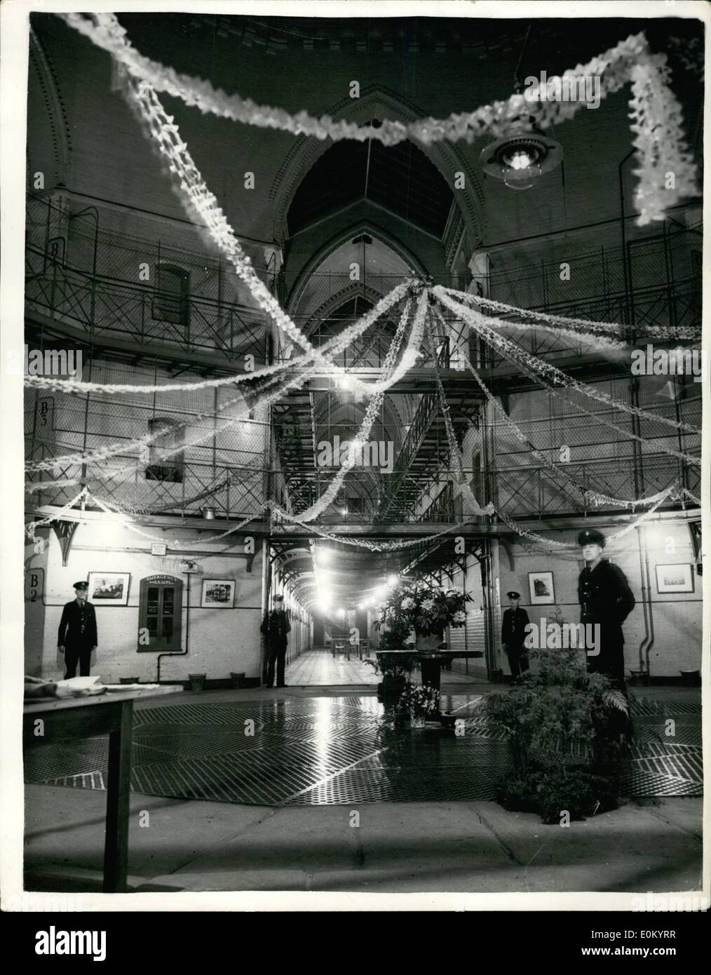 Dec. 12, 1952 - GILDED CAGE... DECORATIONS IN MANCHESTER PRISON FOR CAROL SERVICE... Officers of Strangeways Jail, Manchester had sections of the prison decorated with paper chains for the Carol service held there.. The service was held in the chapel and was attended by the Mayors of many towns including Manchester and Sheffield.. Keystone Photo Shows:- Paper chains hanging from the roof - the centre portion of the prison - during the carol service which was held in the prison. Stock Photo