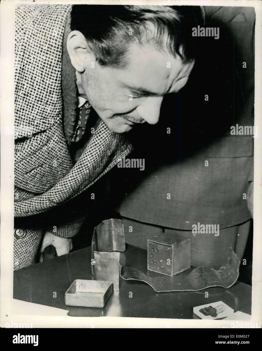 Dec. 18, 1952 - German Couple Charged with having Uranium Block: Helmut Goltzwer, a Berlin sales agent, aged 40, and his 24-year-old girl friend, Gisela Nitzke, were charged yesterday with having in their possession and offering for sale, a block of pure uranium. The block of uranium measures five Square centimetres, and weighs two kilos, 600 grams, and is said to be worth 100,000 dollars. According to the accused, they got it from a ''foreigner'' and it came from the uranium mine at Aue, near Leipsig, in the Russian zone Stock Photo