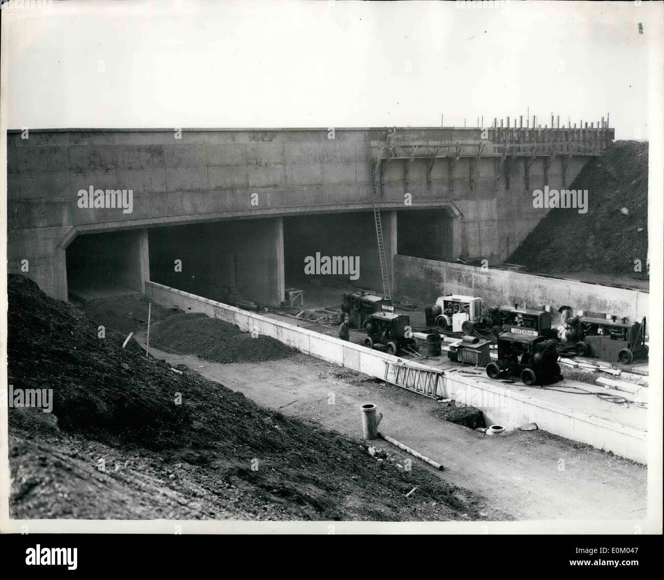 Feb. 02, 1953 - New Maintenance Base for London Airport: A new maintenance base provided for BOAG by the Ministry of Civil Aviation, is under construction at London Airport. Photo shows The southern end of the four-lane tunnel from the Bath Road to the central terminal area under construction. Stock Photo