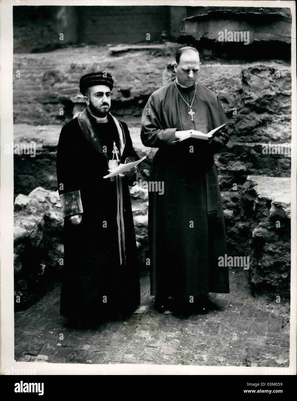 Feb. 02, 1953 - Patrick Visits Ancients Basilica: His Holiness Mrs. Shimun, Christian Dalai Lama of the Assyrian Church, today visited the ancient basilica discovered under the blitzed remains of London's eldest church - St. Bride's Fleet-Street, A short service was conducted in Ayamaic, the language spoken by Christ. The Patriarch is the 119th holder of his office, which is hereditary in his family. He was selected from six boys. all trained from birth - and consecrated at the age of 12. Photo Shows Miss Holiness Mar Shimun conducting the service at St. Bride's today, Stock Photo