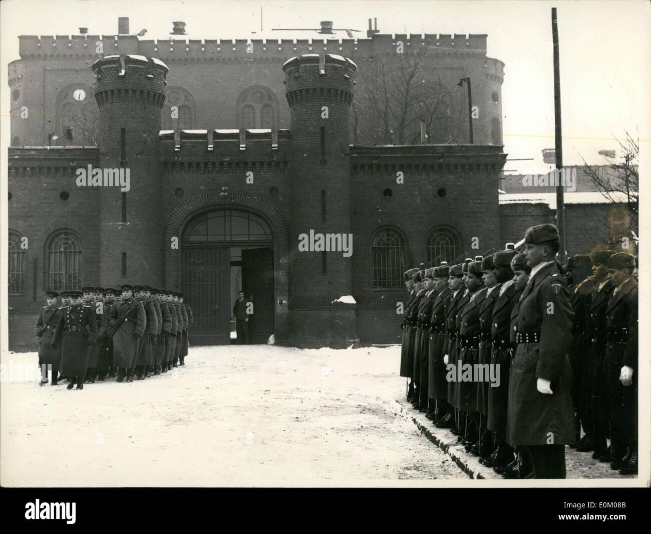 Dec. 25, 1952 - Changing of the Guard at Spandau Prison - Better Christmas for Prisoners? American soldiers took over watching the Spandau Prison from the Russian soldiers. Perhaps that means a better Christmas this year for the prisoners. Our picture shows the American soldiers in their fur hats as the Russian delegation marches by. Stock Photo