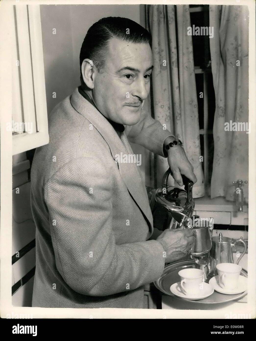 Dec. 31, 1952 - ?The Falcon? in London, first time in fifteen years. hoto Shows: The cheery smile belongs to actor Tom Stock Photo