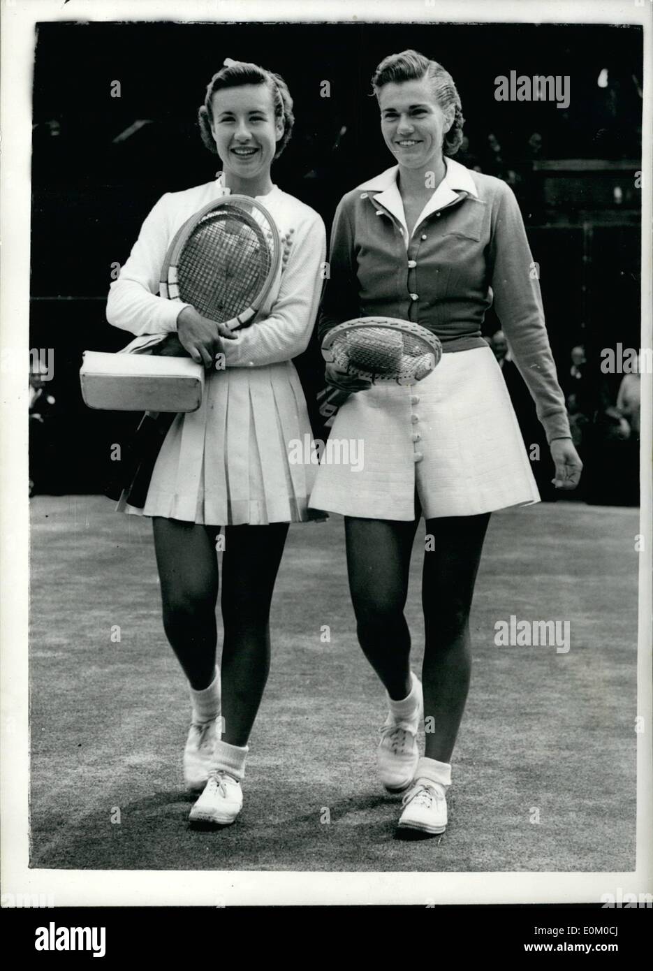 Feb. 02, 1953 - Maureen Connolly Beats Shirley Fry.. Ladies Singles Semi-Final at Wimbledon : Picture Shows: Shirley Fry (right) and Maureen Connolly both of the United States seen walking onto court at Wimbledon this afternoon for their match in the Semi-final of the Ladies Singles event.. Maureen Won 6-1;6-1. Stock Photo