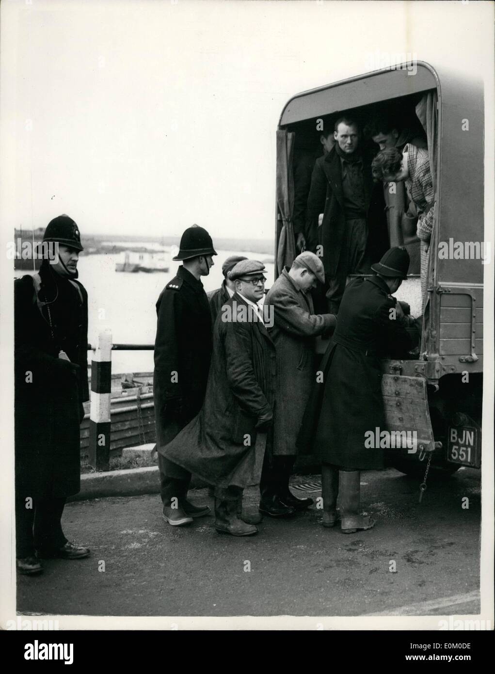 Feb. 02, 1953 - Stopping possible looting at Canvey. Loories cars etc. searched. Photo shows the scene at the entrance to Canvey Island this afternoon as police and officials stop and search a lorry leaving. This is one of the precautions against possible looting. Stock Photo
