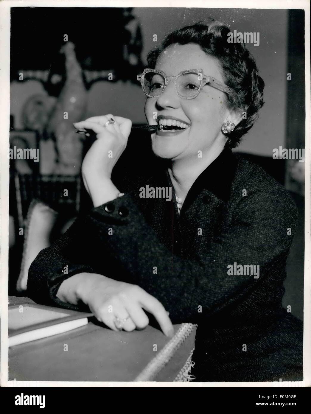 Jan. 01, 1953 - Mrs. Douglas Fairbanks sports silver flecked specs. Discussing training center: Photo shows Mrs. Douglas Fairbanks wore silver flecked spectacles - one of astock of fourteen pairs - to welcome 50 guests at her London home yesterday. Mrs. Fairbanks and her guests were discussing the raising of further &pound;25,000 for R.A.D.A.'s new training theater. Stock Photo