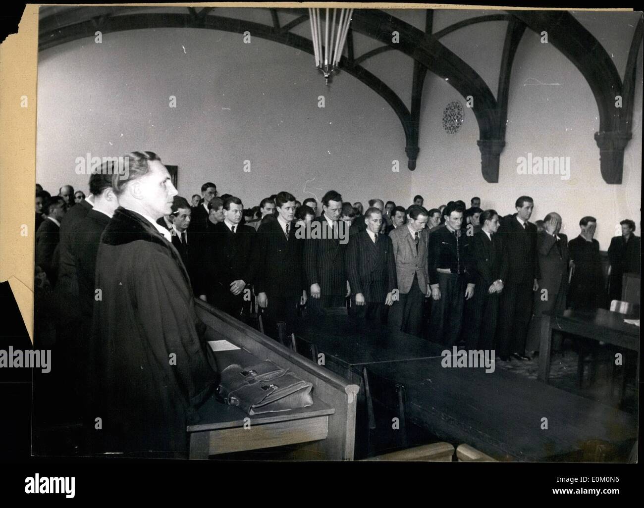 Feb. 08, 1953 - Pronouncing the sentence in the greatest post-war smuggling process - The sentences were pronounced in the greatest post-war smuggling process before the Second Great Criminal Court in Aachen. Nearly all the inhabitants of the Eifel village Muetzenich sat on the prisoner's dock. They were charged with smuggling some 1700 hundredweights of coffee from Belgium to Germany. By doing that they caused the German state a loss of taxes of DM 1.300.000 Stock Photo