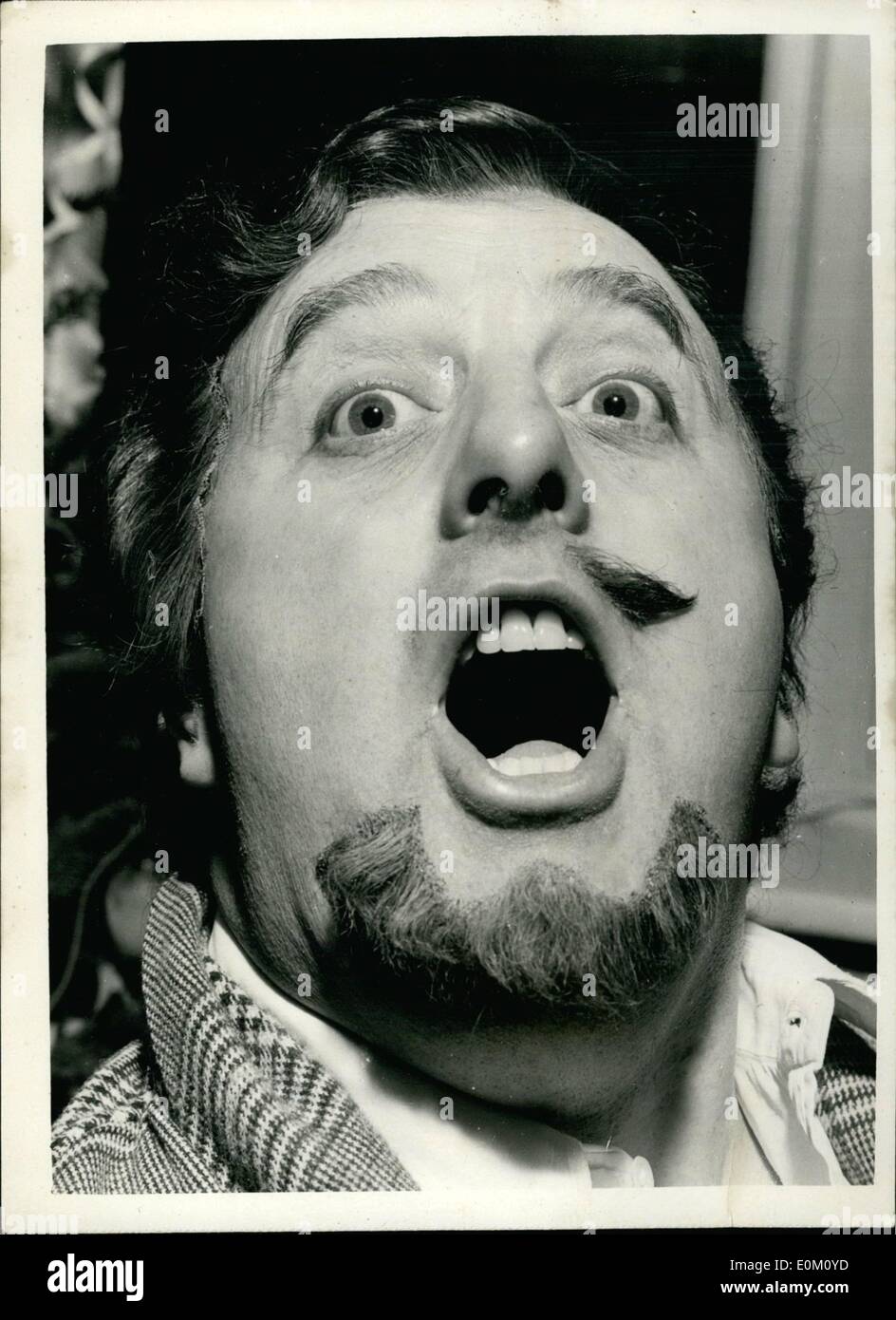Jan. 01, 1953 - The Tenor Took A Deep Breath And Swallowed Half Hit Moustache: The man with half a moustache is opera singer Walter Midgley. He swallowed the other half - it was false - while singing as the dashing Duke of Mantua in Rigoletto at Covent Garden. Doctors removed the remains of it yesterday. The rest Walter coughed up when he turned his back on the New Year's Eve audience. Stock Photo