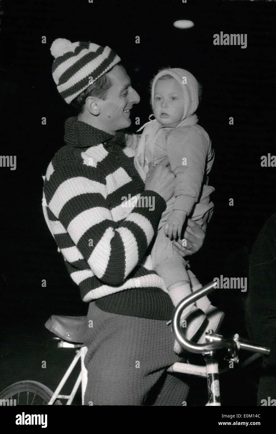 Feb. 27, 1953 - The Round of Squirrels has started. After a first night, the bikers slow down and wear warm clothing to fight the cold. While his colleagues roll on, Monticelli talks with his daughter who has come to encourage him. Stock Photo