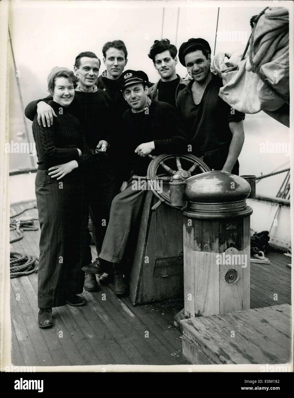 Jan. 16, 1953 - Getting Ready for 30,000 Mile Voyage in Yacht. Six Members aboard the ''Asta''. A party of nine people are preparing their 88 tons ex German Ketch ''Asta'' in the Hamble River, Hampshire for the start of their 30,000 miles ''Roundabout'' voyage to San Fransisco via the Mediterranean, the Red Sea, Ceylon and the East Indies. The Vessel will be under the command of Frenchmen Richard Aramburu who was a fisherman in South America and who comes from Marseilles. Keystone Photo Shows: Six members of the crew seen aboard the ''Asta'' at Hamble. They hope to leave on Friday Stock Photo