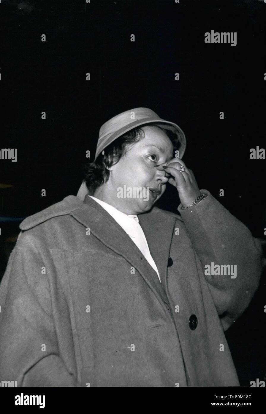 Jan. 19, 1953 - Painter Schwarz Abrys appeared before the district court this afternoon for having slapped Mrs. Petrides, a painting vendor. Mrs. Petrides shows her nose to the judge which should have had correctional plastic surgery following the incident. Stock Photo