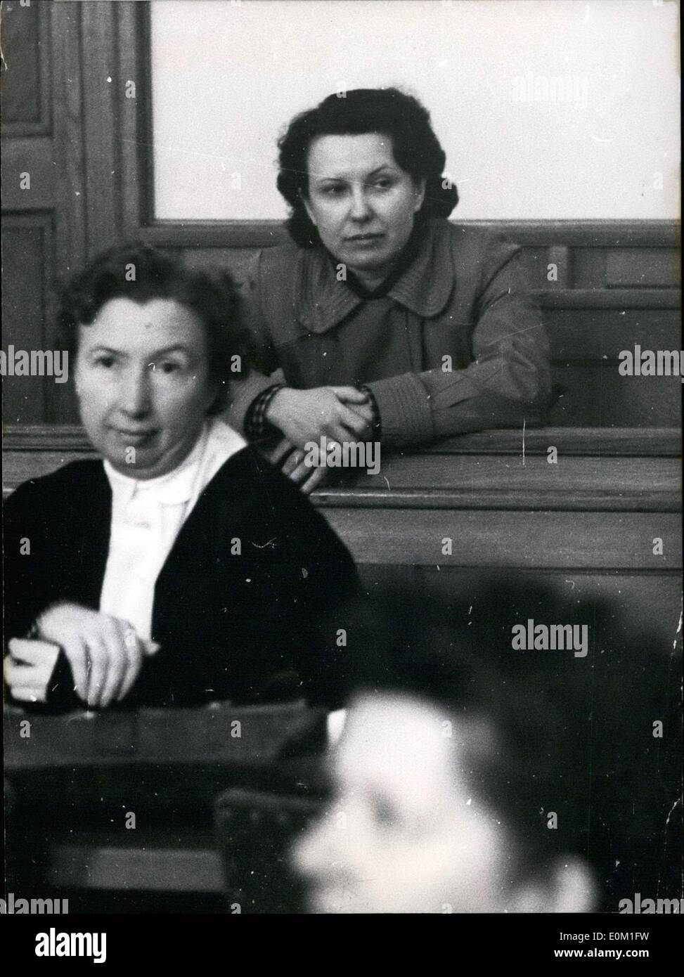 Mar. 25, 1953 - The ''Red Olga'' in front of the L?neburg High Court. In front of an overfilled courtroom, the trial of Olga Robine began on Wednesday. After a four hour process the lawyer for the state rested his case. Our picture shows the ''Red Olga'' with her defense attorney Dr. Elisabeth Ziegert, L?neburg. Stock Photo