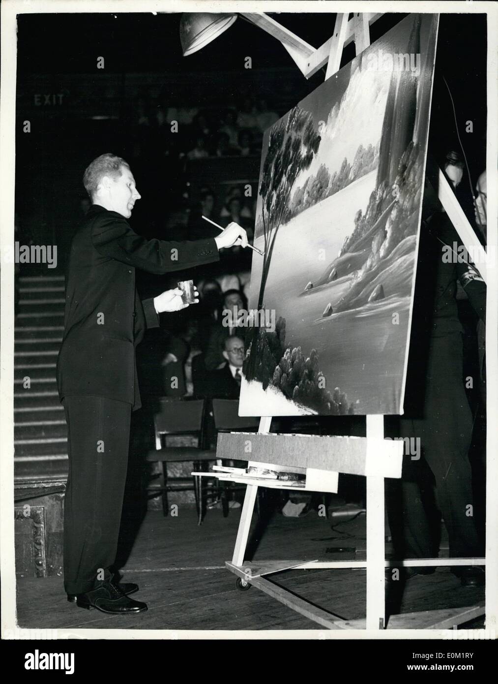 Apr. 04, 1953 - Faster paints for the blim revivalist 4000. To illustrate his point to 4000 devotees of the Elim four Sayre gospel in the Albert hell, London last night, pastor Willard Cantelon, from Washington, D.C. got out his pairs. An in 15 minutes he had completed a picture in oils of the place where Christ was baptized in the River Jordan, There were no figures, either of Jesus or anyone else - it was a pure landscape done in bright and simple colours Stock Photo