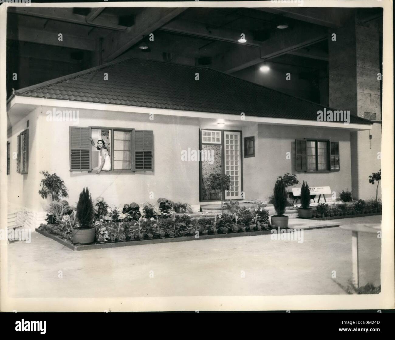 Apr. 04, 1953 - The Emigrant can take home with him. New Transportable house at B.I.F. an interesting exhibit at the British industrial fair which opened this morning at Earl's court, Olympia and Biringhen - was the ''unitroy'' house - a complete hose that packs into two lorries - is abstracted to any design - can be shipped and easily erected by a minimum of skilled labor, at once becoming a permanent home. With a life as long as any known form of contraction Stock Photo