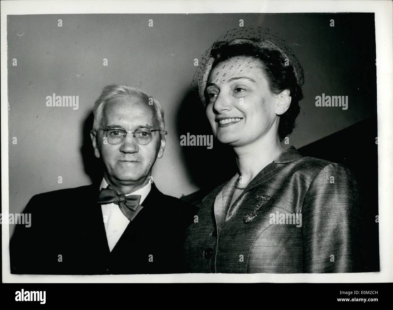 Apr. 04, 1953 - Sir Alexander Fleming weds.: Sir Alexander Fleming, the discoverer of penicillin, who is 71, was married today to Mrs. Amalia Coutsourie, a Greek woman surgeon. The wedding at Chelsea Register Office is to followed by a second ceremony at the Greek Orthodox Church in Bayswater. Sir Alexander's first wife died in 1949. Photo shows the bride and groom seen leaving Chelsea Register Office today. Stock Photo