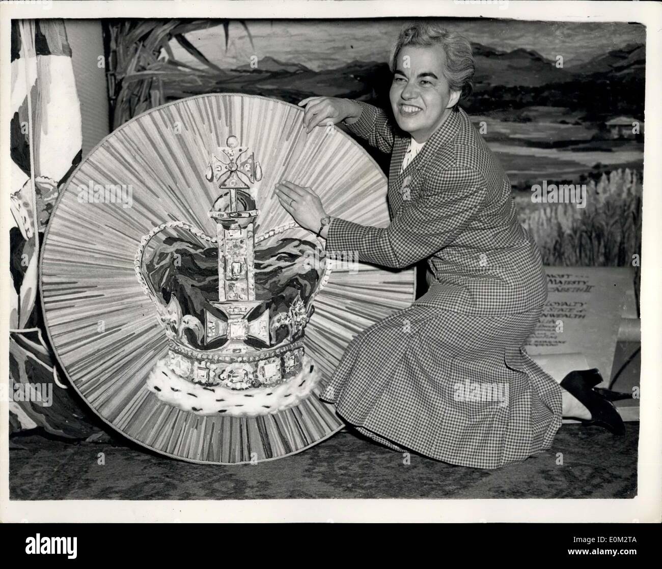 May 13, 1953 - Coronation Window Display By Australian Artist. Designs In Wool - At Queensland House: A press preview was held this afternoon at Queensland House, Strand - of the Coronation Window Display - the work in wool - by Australian artist Edith Kenton from Adelaide. Photo shows Edith Kenton puts the finishing touches to one of the Wool crowns - at Queensland House this afternoon. Stock Photo