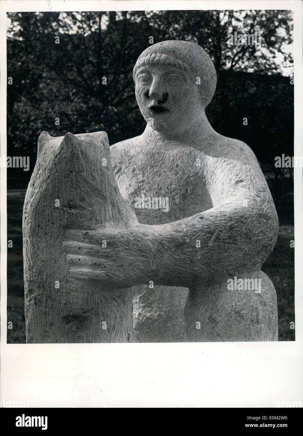 May 15, 1953 - Criticizing modern works of Art - the Duisburg Way.: The city of Duisburg, West Germany, had acqaired a plastic from young Karl REindl, a Landshut Sculptor. Though the work had been distinguished with the 2nd price, by the Industry Board, Duisburg citizens did not like the plastic at all. The official title ''Sitting  with a dog'' was changed by Duisburgers in ''Little Hood with the Wolf'' When an unknown man (eligible) and marked the face with Hitler's (eligible) magistrate decided to remove the (eligible) the plinth. Stock Photo
