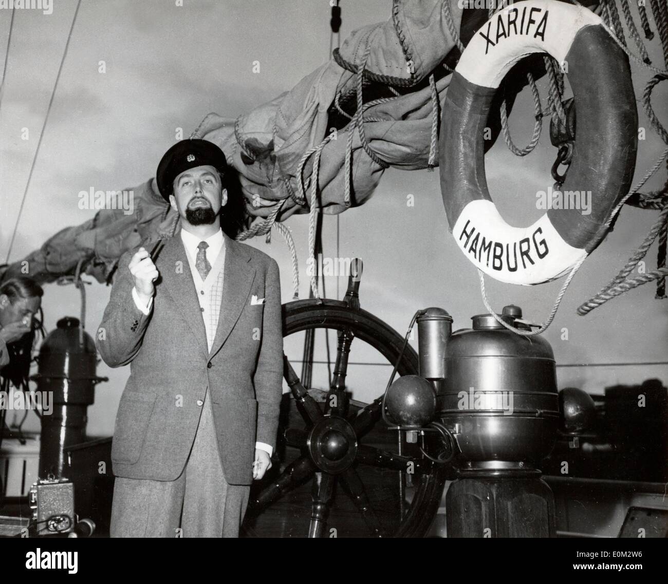 Pioneer of diving Hans Hass in a captains uniform on a boat Stock Photo