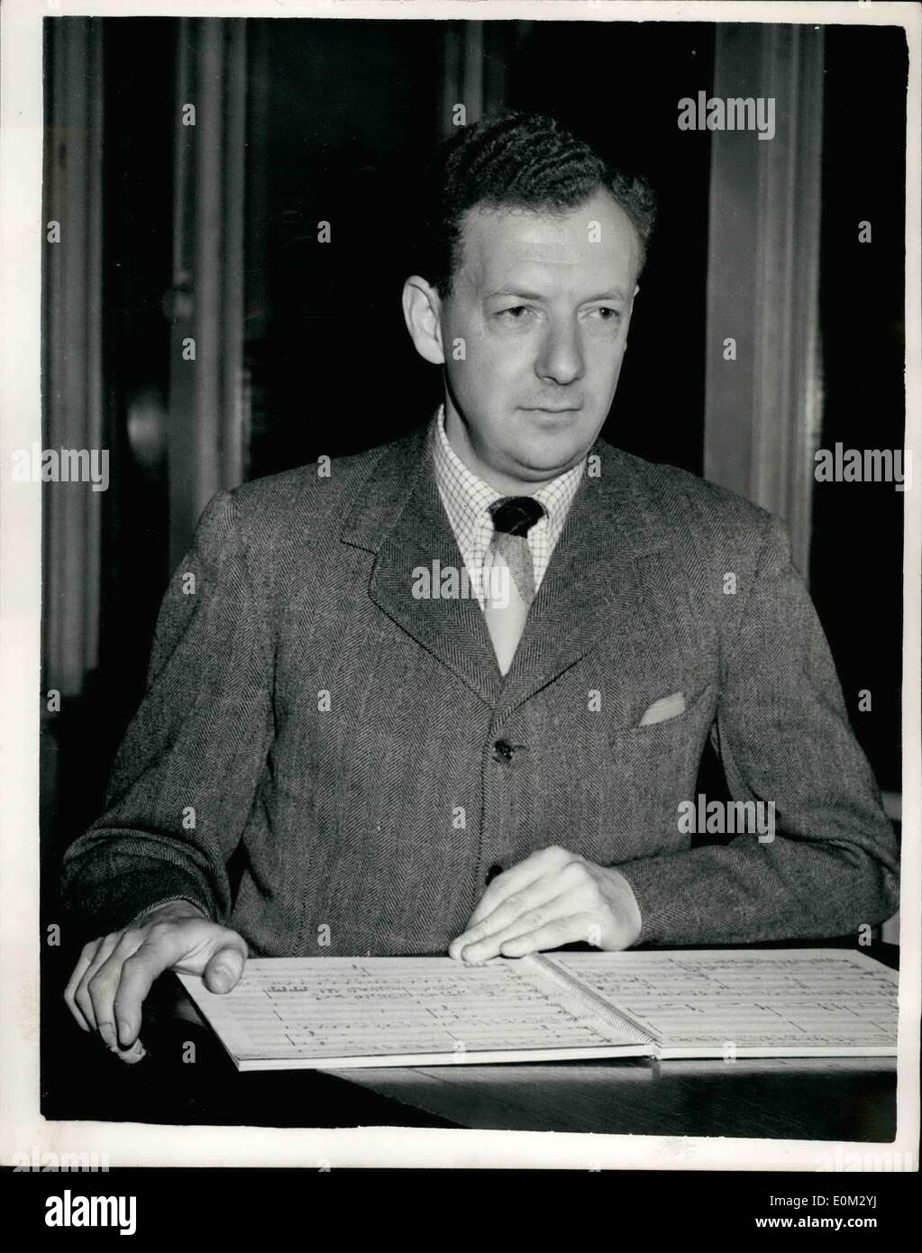 Apr. 14, 1953 - 14-4-53 Benjamin Britten with his Coronation Opera score. Working at Covent Garden. Mr. Benjamin Britten the famous British composer was to be seen at Covent Garden Opera House this afternoon, working on his new Coronation Opera . Keystone Photo Shows: Benjamin Britten seen with the score of his new work at the Opera House this afternoon. Stock Photo