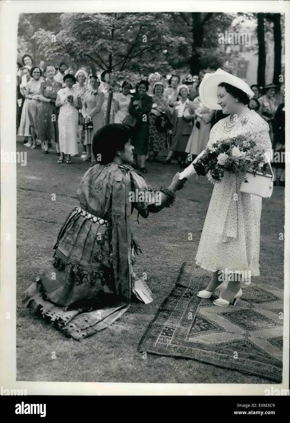 Jun. 06, 1953 - Queen Mother attends garden party; A garden party organized by the Women's Corona Club, was held at Lambeth Palace yesterday, in the presence of Queen Elizabeth the Queen mother. Photo Shows The queen mother receiving Laiy Marata Sukuna, of Fiji at the garden party. Stock Photo
