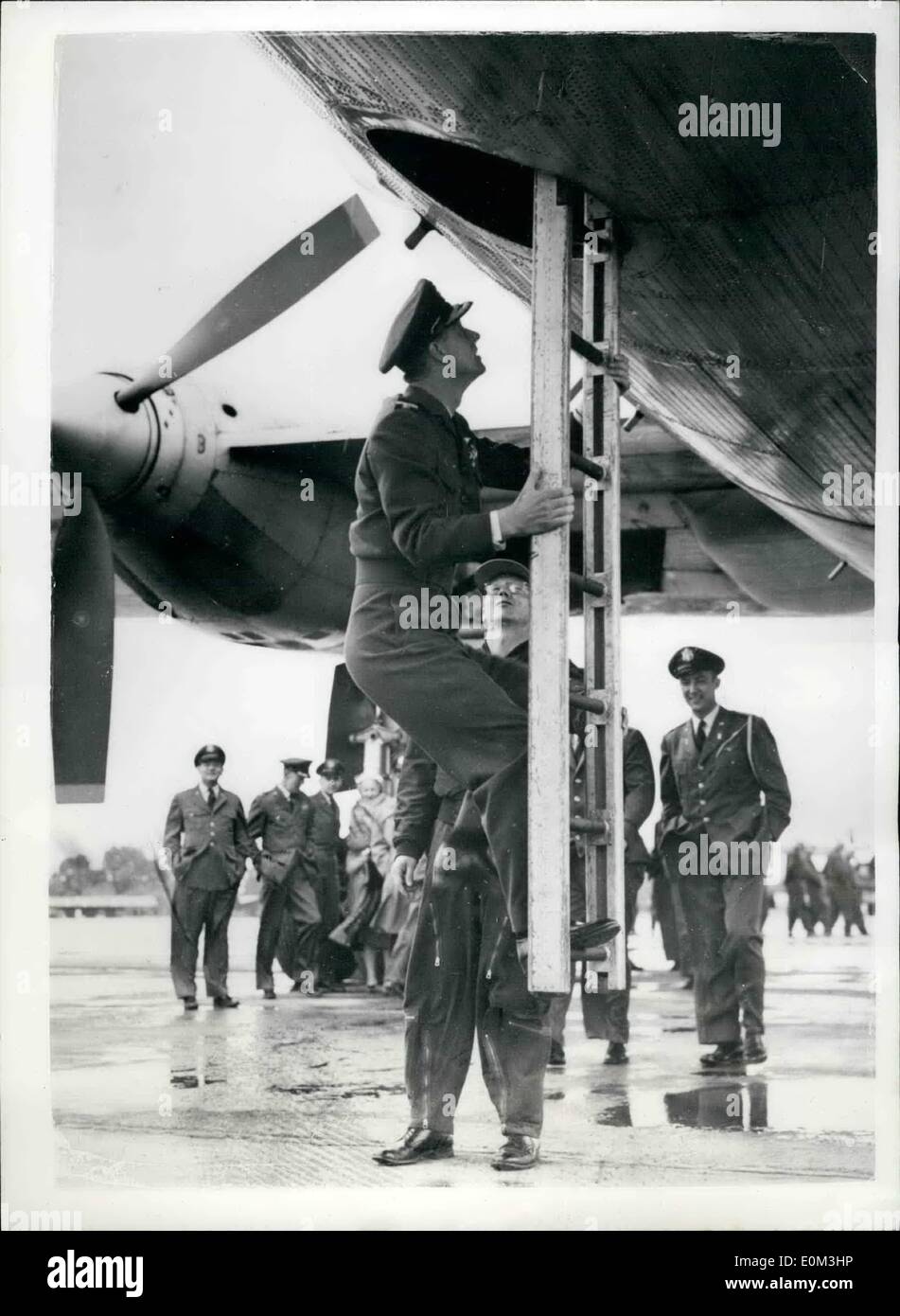May 05, 1953 - Duke Inspects U.S. Atom Bomb Carrier: The Duke of Edinburgh climbs up int the giant RB. 36. the world's largest operational bomber, at Brize Norton, Oxfordshire, yesterday, Bases. The Duke, who flew 400 miles in a Viking aircraft of The Queen's Flight, also inspected American troops at Bentwaters, Sussex and Burtonwood, Lancashire. At Brize Norton, he inspected gun sites and crews. Stock Photo