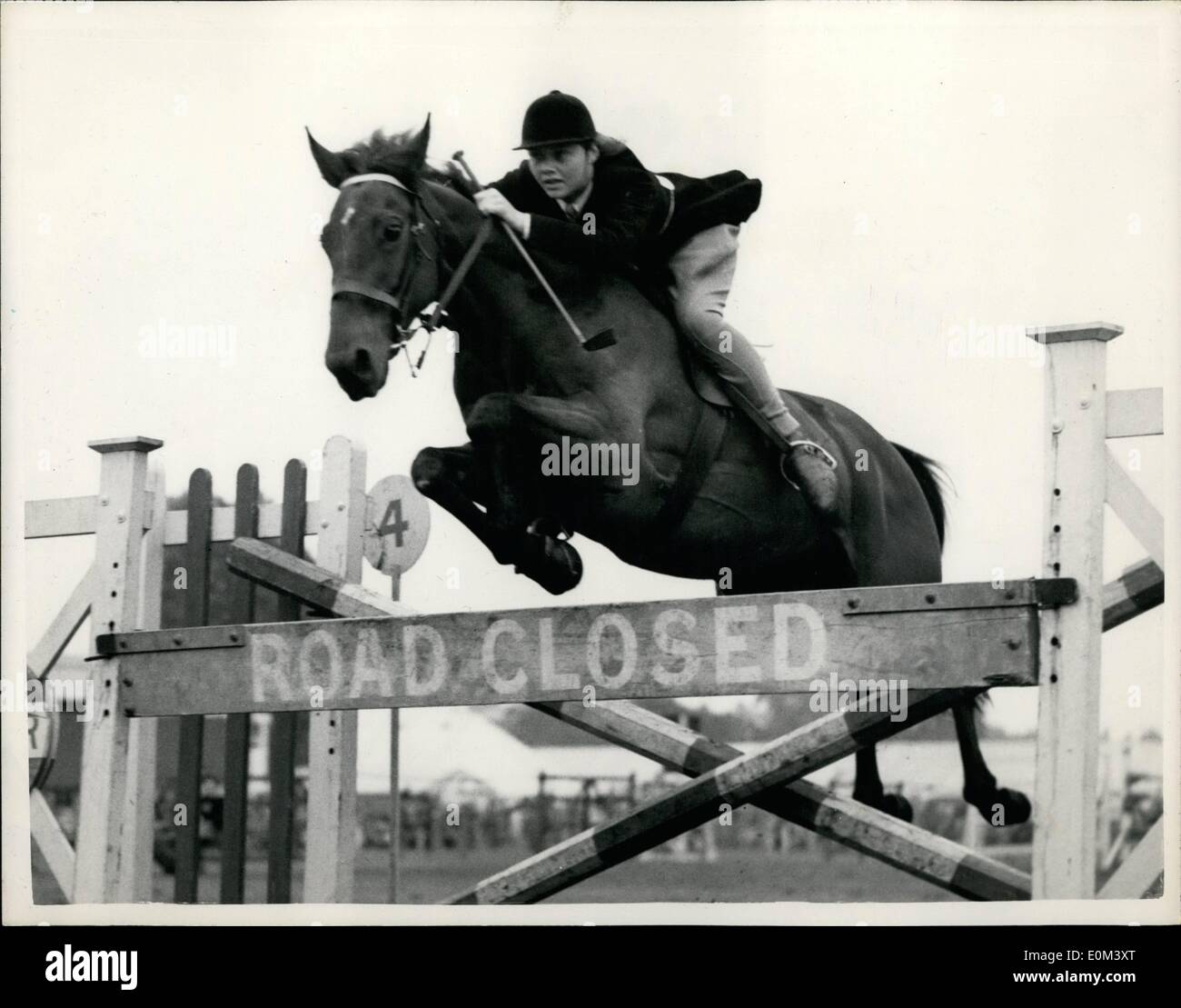 Jun. 06, 1953 - Richard Royal Horse Show Richard Jumping Event: Photo shows. Sixteen year old Miss Guillian Day on her Bay Belding ''Dauntless''-taking a jump during the Children's Jumping Event Class 18 during the Royal Richmond Horse Show. Stock Photo