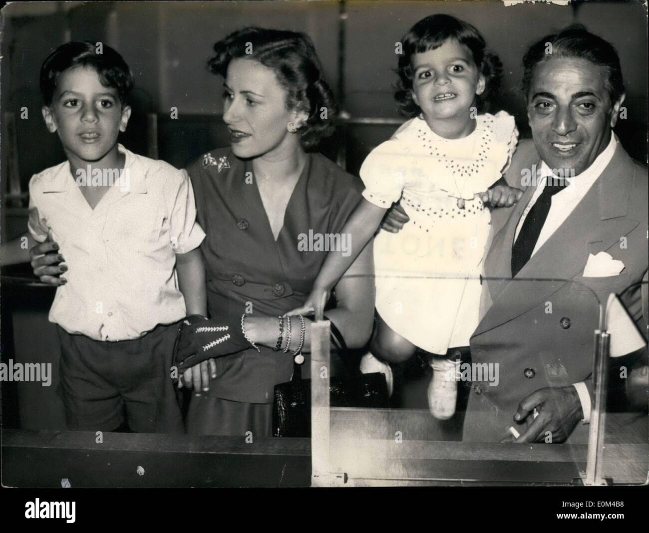 Jul. 25, 1953 - Aristotle Onassis was one of the richest shipping magnates in the world. Here he is pictured with: Alexander(5), wife Athina(25), and Christine(2). Actress Sophia Loren with Marc Bohan's Models Stock Photo