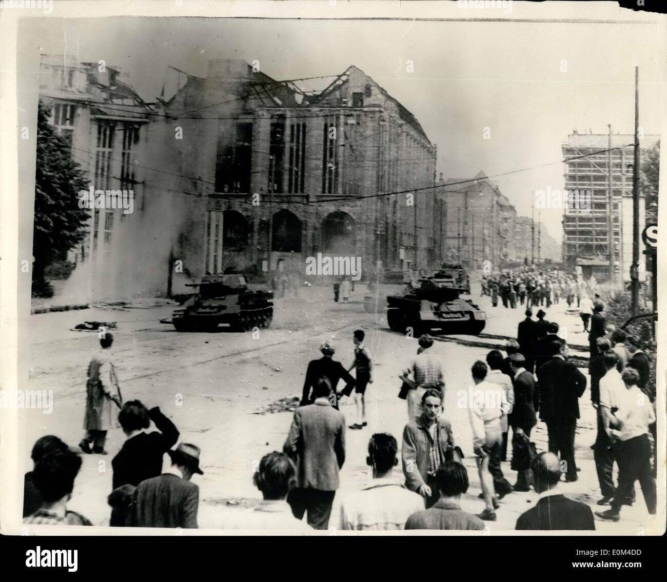 Jun. 18, 1953 - Red Army Seals Off East Berlin. Tanks And Armoured Cars Open Fire: East Berlin was last night sealed off by thousands of Russian troops, with at least 25 heavy vengs commanding strategic points, after five hours of rioting and street battles between strikers and demonstrators on the one hand and Soviet Sector police on the other. Photo shows Soviet tanks seen moving through East Berlin yesterday, when they were used to try and disperse the thousands of rioting workers. Stock Photo