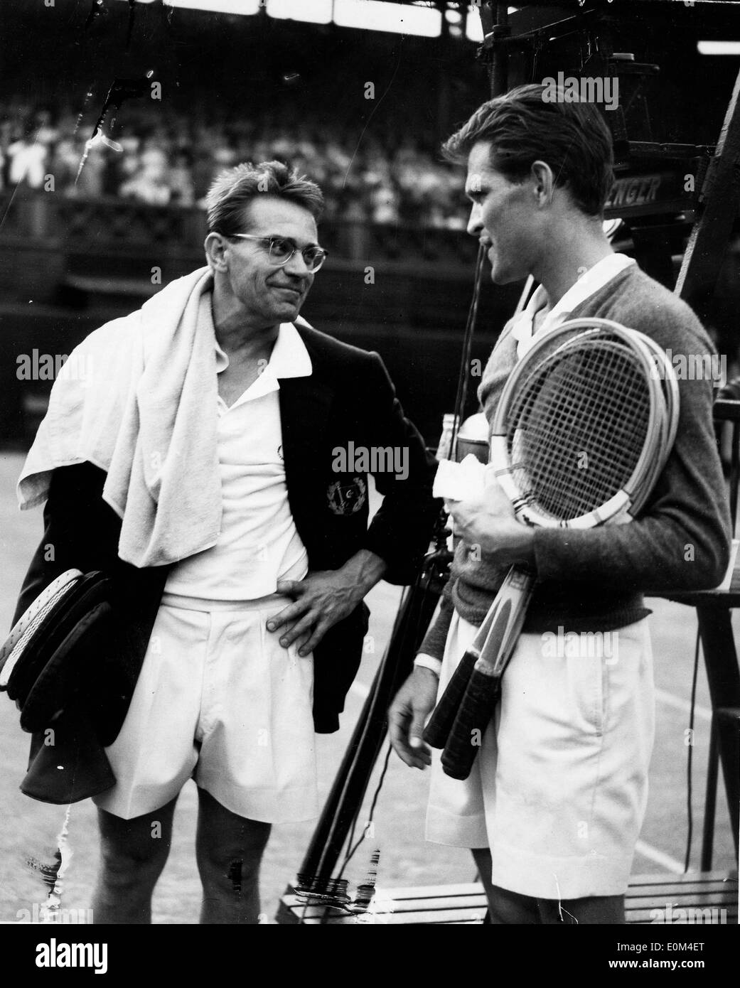 Tennis Stars Jaroslav Drobny and Budge Patty talking at Wimbledon Stock Photo