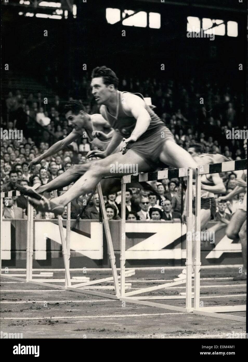 Jul. 07, 1953 - Athletic games national championship at Colombes; Chardel (at the further end) winning the 110 meters hurdles beating Ignace, Heinrich. Stock Photo