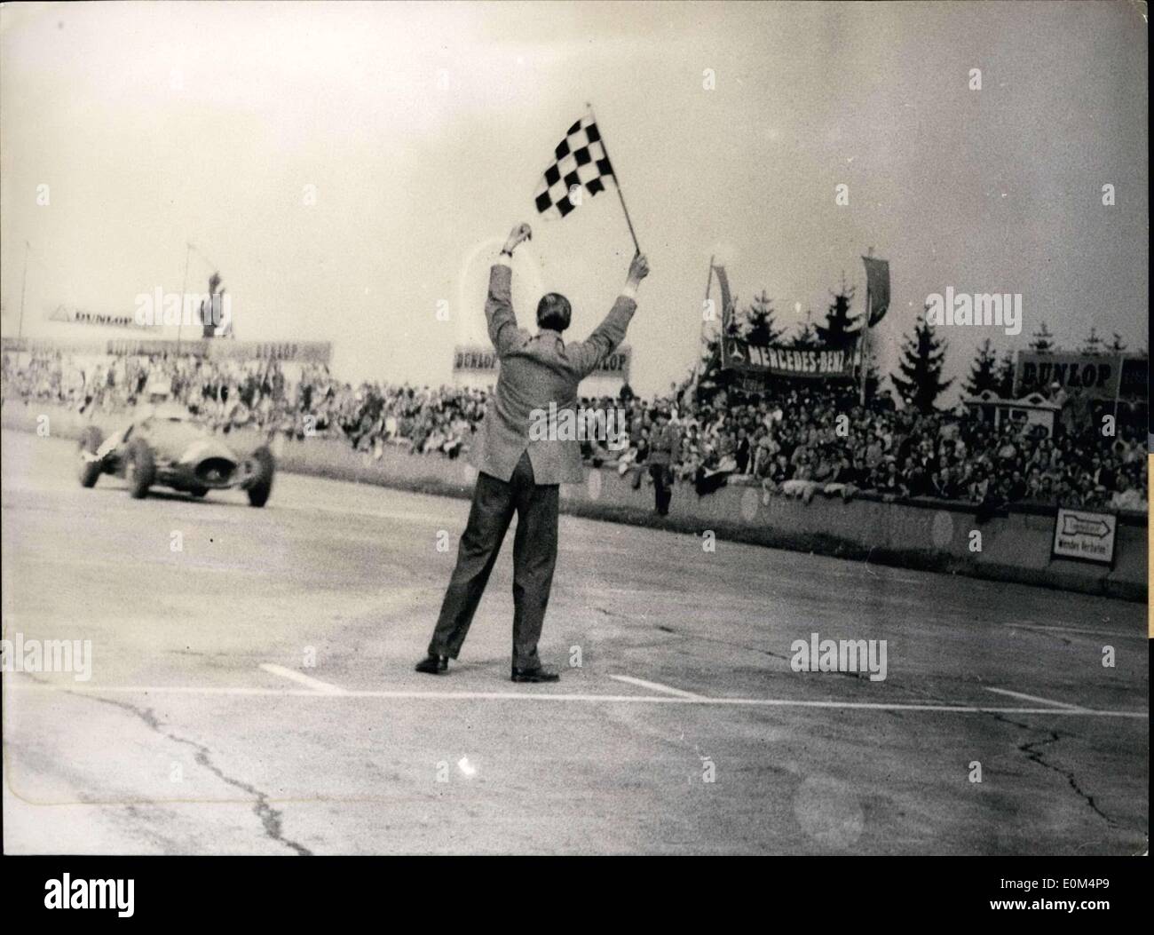 Aug. 03, 1953 - Pictured is racer Giuseppe Farina as he crosses the finish line in a race at Nuerburgring in Germany. Im Stock Photo
