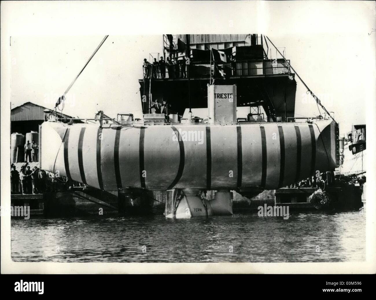 Aug. 08, 1953 - Professor Piccard's ''Bathysphere' Is Launched In Italy: Professor Piccard's ''bathysphere'', the vessel in which the professor hopes to explore the dephs of the Tyrrhenean Sea, and set up a record dive of 13,000-ft., was launched at Castellamare di Stabia, Italy. The vessel consists of two main parts - a cigar-shaped structure of watertight compartments which will house the special liquid which will be used for surfacing, and a lower part which is the actual sphere from which observations will be made Stock Photo