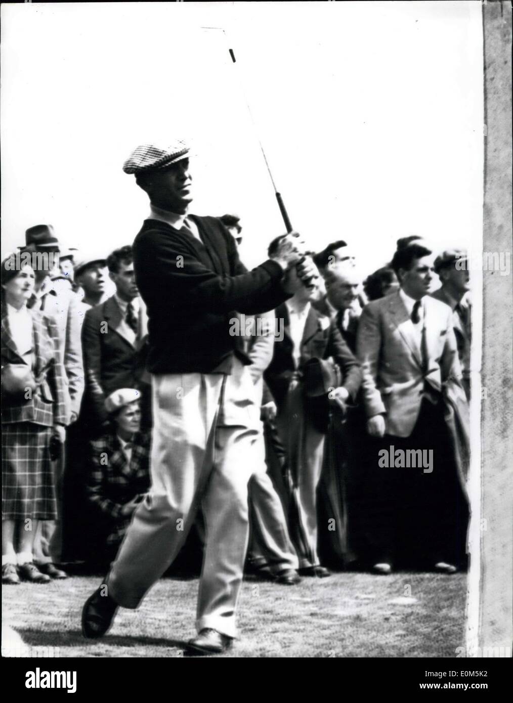 Jul. 08, 1953 - 8-7-53 British Open Golf Championship. Bobby Locke, the reigning champion, is leading the field in the British Open Golf Championship being held in Carnoustie. U.S. champion, Ben Hogan was nine points behind Locke after yesterday's play. Keystone Photo Shows: Ben Hogan driving from the 2nd tee, at Carnoustie yesterday. Stock Photo