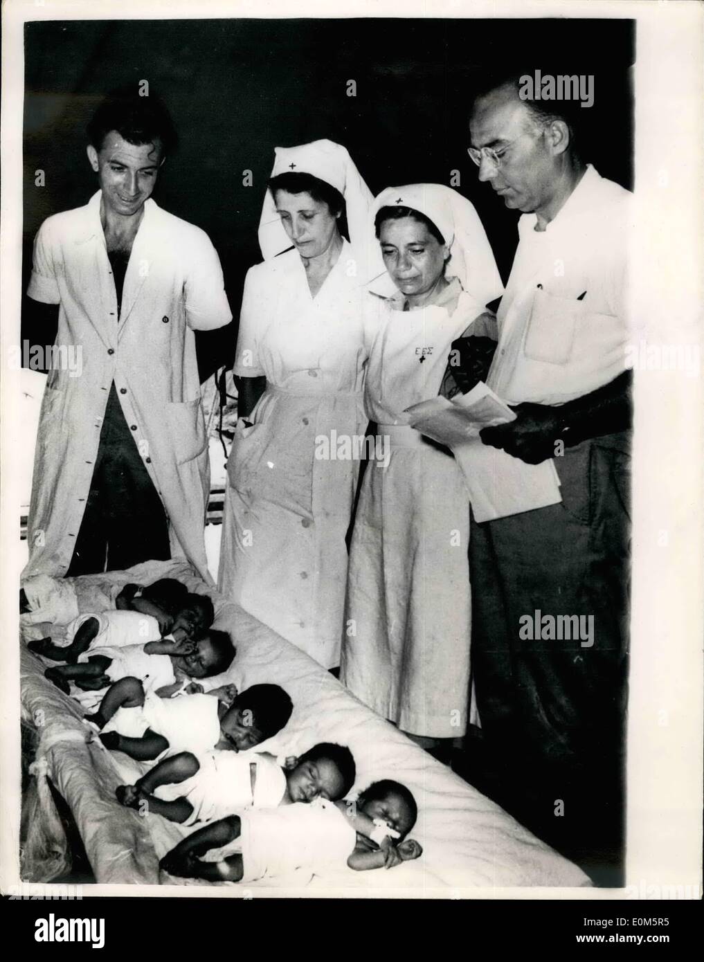 Aug. 28, 1953 - 28-8-53 Earthquake Babies. Soon after the first medical units landed at Argostoli, capital of the earthquake-stricken Ionian Island of Cephalonia, they set up first aid and dressing station and a temporary hospital in which six babies were born recently. Keystone Photo Shows: The six babies seen in the temporary hospital at Argostoli, after their birth recently. Stock Photo